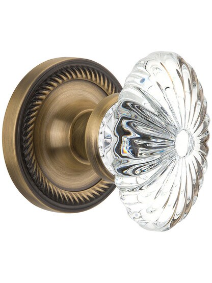 Rope Rose with Oval Fluted Crystal Knob in Antique Brass with .